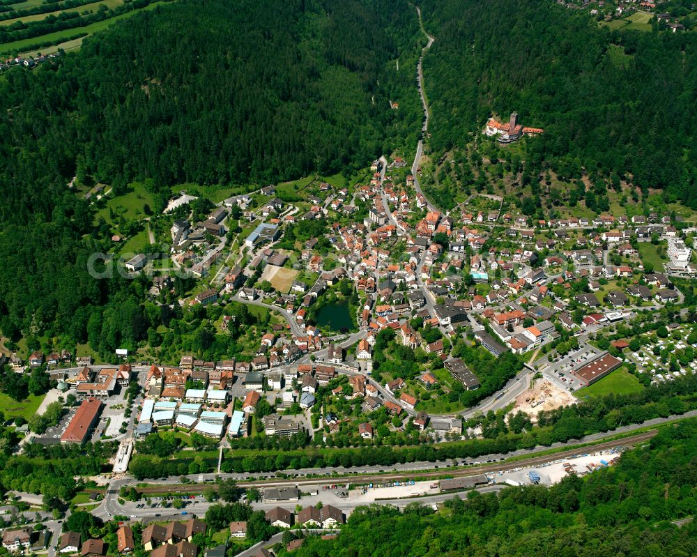 Bad Liebenzell from the bird's eye view: Urban area with outskirts and inner city area surrounded by woodland and forest areas in Bad Liebenzell in the state Baden-Wuerttemberg, Germany