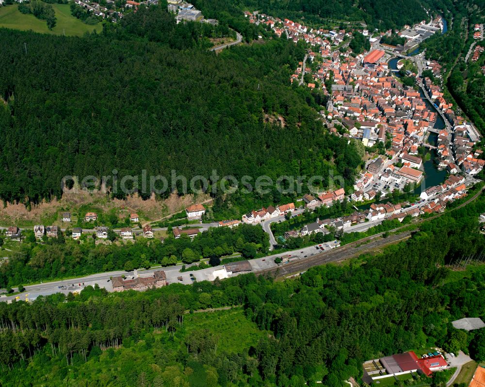 Calw from above - Urban area with outskirts and inner city area surrounded by woodland and forest areas in Calw in the state Baden-Wuerttemberg, Germany