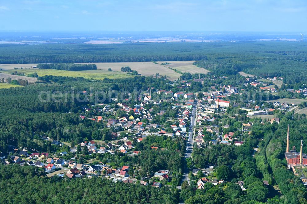 Aerial photograph Crinitz - Urban area with outskirts and inner city area surrounded by woodland and forest areas on street Hauptstrasse in Crinitz in the state Brandenburg, Germany