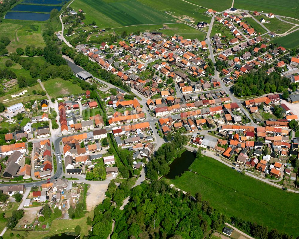 Hasselfelde from above - Urban area with outskirts and inner city area surrounded by woodland and forest areas in Hasselfelde in the state Saxony-Anhalt, Germany