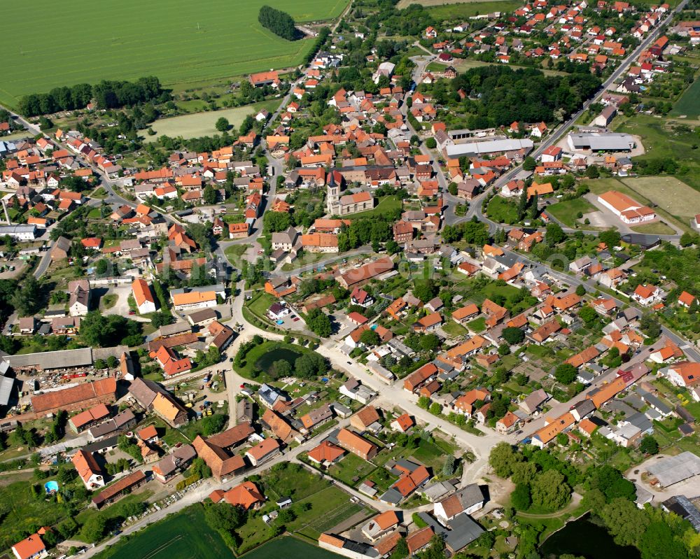 Heudeber from the bird's eye view: Urban area with outskirts and inner city area surrounded by woodland and forest areas in Heudeber in the state Saxony-Anhalt, Germany