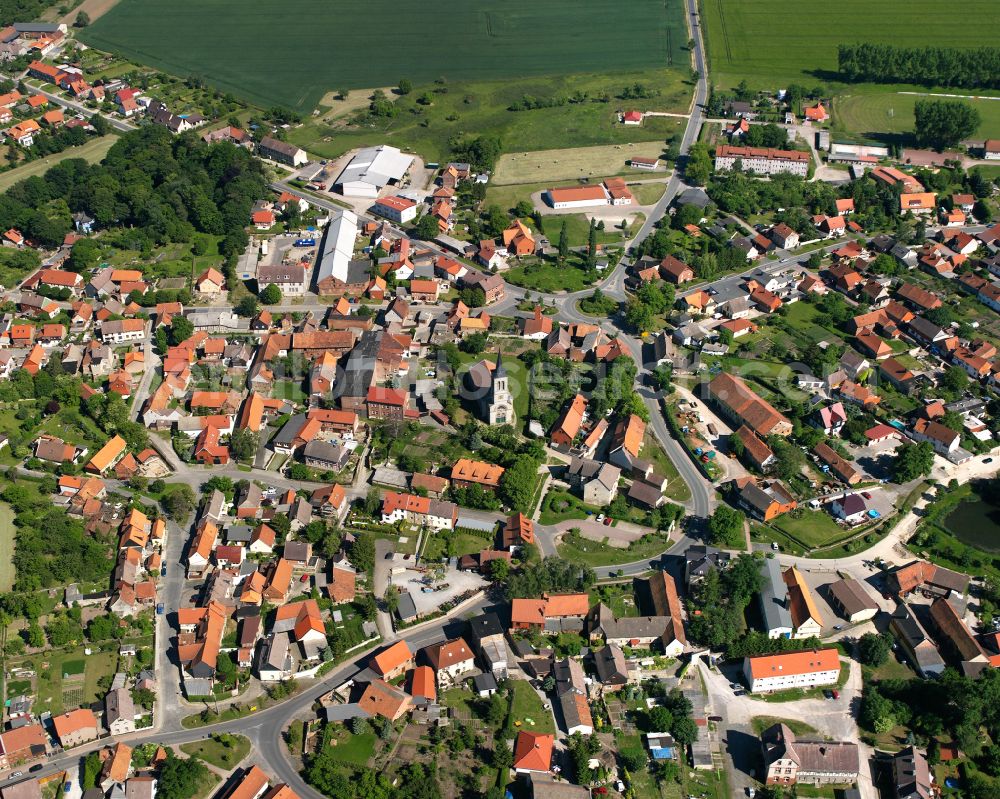 Aerial image Heudeber - Urban area with outskirts and inner city area surrounded by woodland and forest areas in Heudeber in the state Saxony-Anhalt, Germany