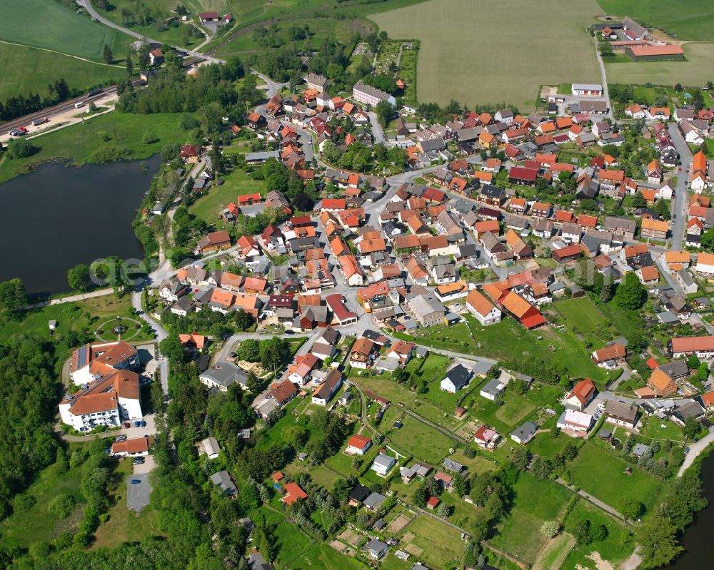 Aerial image Stiege - Urban area with outskirts and inner city area surrounded by woodland and forest areas in Stiege in the state Saxony-Anhalt, Germany