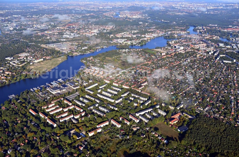 Aerial image Berlin - Cityscape traversed by clouds overlooking the autumnal district of Koepenick along the river Dahme witha view of the Rohrwall-Island in Berlin. Residential areas and green space along Wendenschlossstrasse