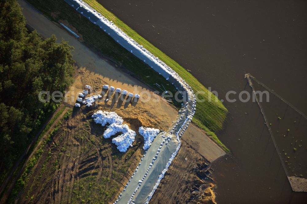 Aerial image Gerwisch - Preparing for flood protection embankment reinforcement on the flood plains on the banks of the River Elbe in Saxony-Anhalt in Gerwisch