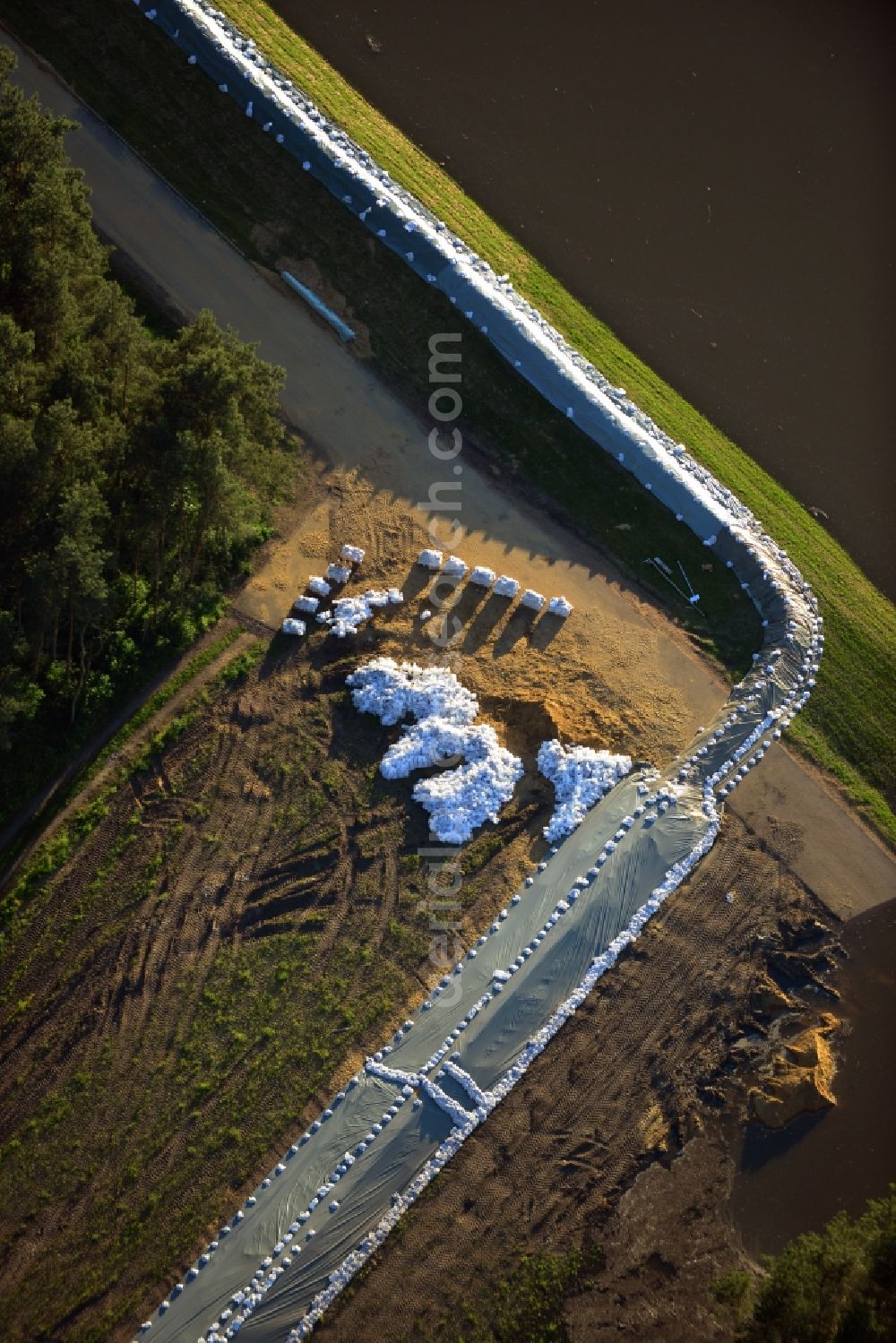 Aerial photograph Gerwisch - Preparing for flood protection embankment reinforcement on the flood plains on the banks of the River Elbe in Saxony-Anhalt in Gerwisch