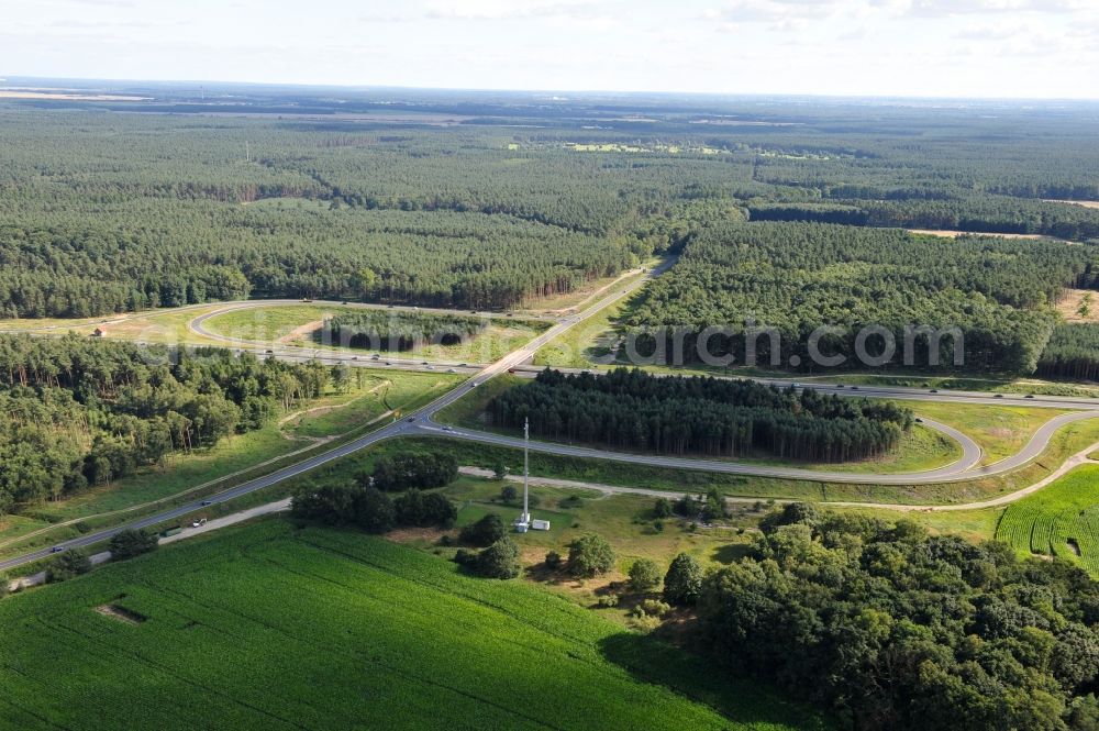 Kremmen from the bird's eye view: Preparations resp. tree felling for the expansion of the junction Kremmen - Havelland at the motorway A10 and A24 in the state Brandenburg