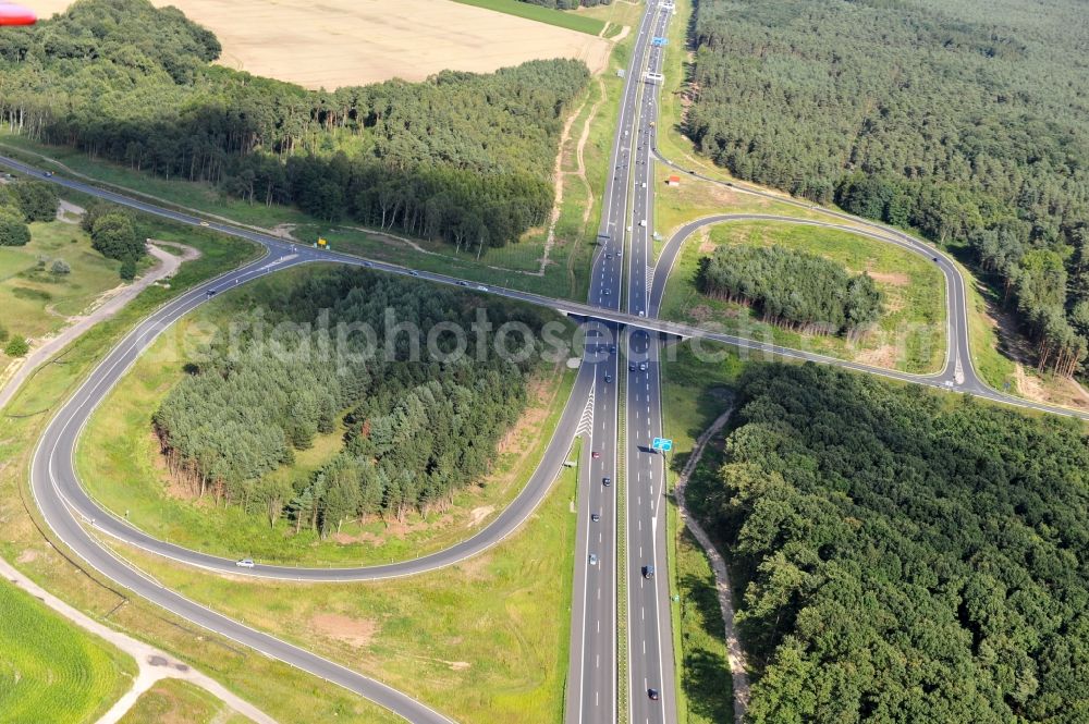 Kremmen from the bird's eye view: Preparations resp. tree felling for the expansion of the junction Kremmen - Havelland at the motorway A10 and A24 in the state Brandenburg