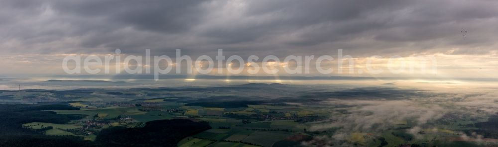 Burgebrach from the bird's eye view: Forest and mountain scenery of Steigerwald at sunrise in Burgebrach in the state Bavaria, Germany