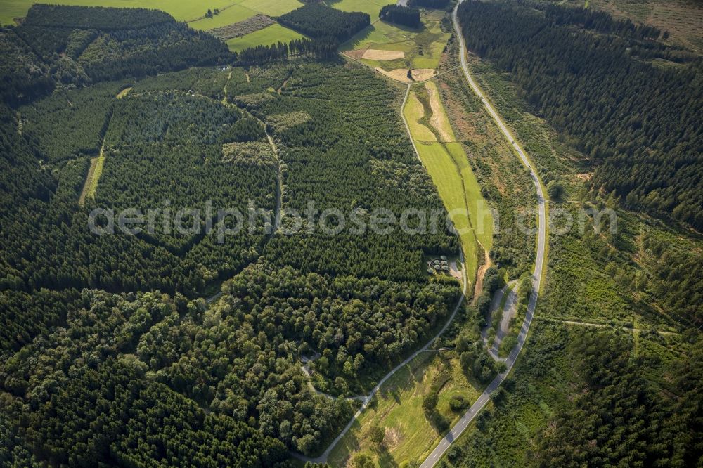 Aerial photograph Winterberg - A forestland on the road 740 (L740) in the vicinity of Winterberg in the state North Rhine-Westphalia. In this forest area is the spring of the Ruhr and the Rothaarsteig