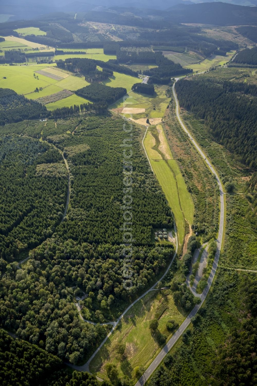 Winterberg from above - A forestland on the road 740 (L740) in the vicinity of Winterberg in the state North Rhine-Westphalia. In this forest area is the spring of the Ruhr and the Rothaarsteig