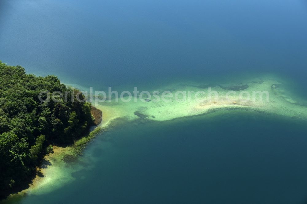 Heimland from above - Forests on the shores of Lake Grosser Wummesee in Heimland in the state Brandenburg