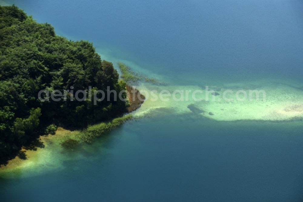 Heimland from the bird's eye view: Forests on the shores of Lake Grosser Wummesee in Heimland in the state Brandenburg