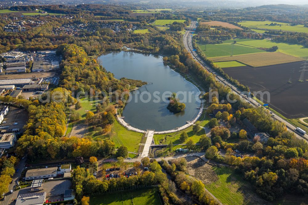 Bochum from above - forests on the shores of Lake Uemminger See in Bochum in the state North Rhine-Westphalia, Germany