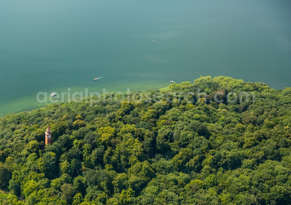 Neubrandenburg from above - Forests on the shores of Lake Tollensesee with look-out Behmshoehe and motoboats in Neubrandenburg in the state Mecklenburg - Western Pomerania