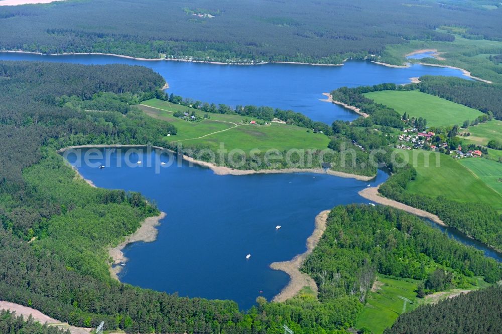 Aerial photograph Kleinmenow - Forests on the shores of Lake Menowsee in Kleinmenow in the state Brandenburg, Germany