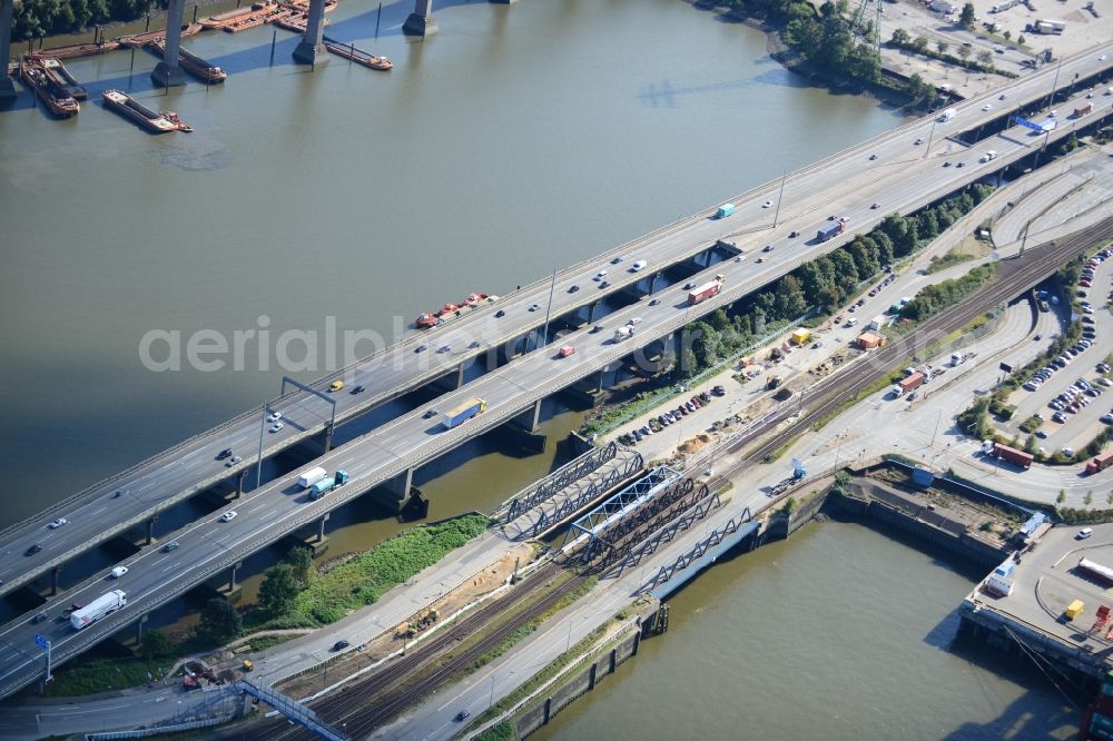 Hamburg from the bird's eye view: Railway bridge Waltershof and motorway bridge A7 in Hamburg-Mitte / Waltershof. A project of the Hamburg Port Authority HPA