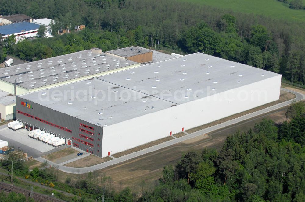 Aerial image Langenselbold - Erweiterungsbau Logistiklager My Toys am Warenverteilzentrum Schwab im Gewerbegebiet Langenselbold. Ein Projekt der ECE Projektmanagement G.m.b.H & Co. KG. Annex building of the logistics centre My Toys at the distribution centre Schwab in the business park Langenselbold. A project of ECE Projektmanagement G.m.b.H & Co. KG.