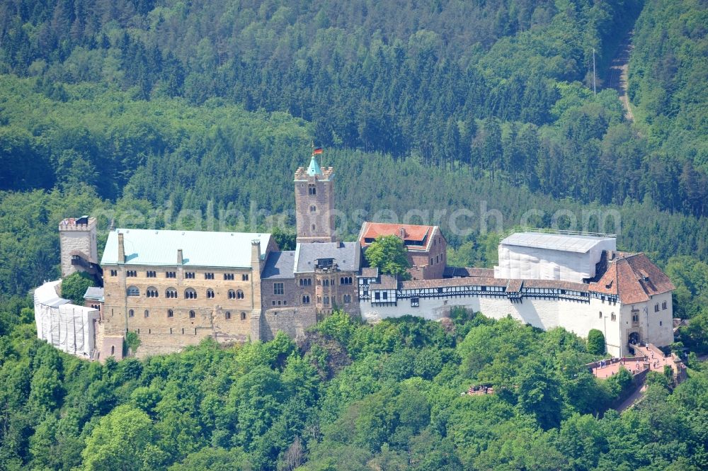 Aerial image Eisenach - View of the Wartburg-Stiftung Eisenach near Eisenach in Thuringia. The castle dates from the 11th Century, but has its present form since the mid-19th Century. Since 1999 it is a UNESCO World Heritage Site