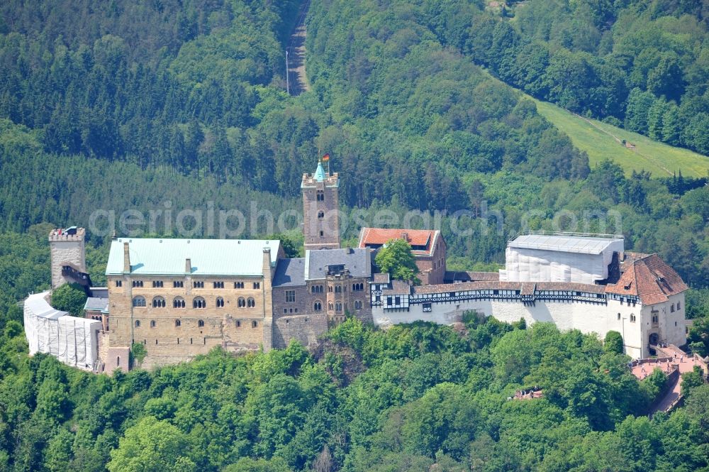 Aerial photograph Eisenach - View of the Wartburg-Stiftung Eisenach near Eisenach in Thuringia. The castle dates from the 11th Century, but has its present form since the mid-19th Century. Since 1999 it is a UNESCO World Heritage Site