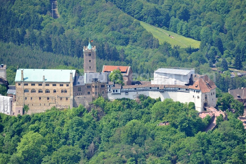 Eisenach from above - View of the Wartburg-Stiftung Eisenach near Eisenach in Thuringia. The castle dates from the 11th Century, but has its present form since the mid-19th Century. Since 1999 it is a UNESCO World Heritage Site