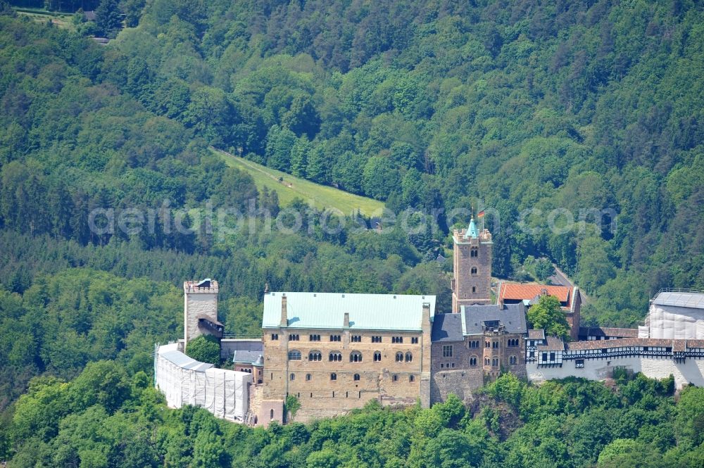 Aerial image Eisenach - View of the Wartburg-Stiftung Eisenach near Eisenach in Thuringia. The castle dates from the 11th Century, but has its present form since the mid-19th Century. Since 1999 it is a UNESCO World Heritage Site