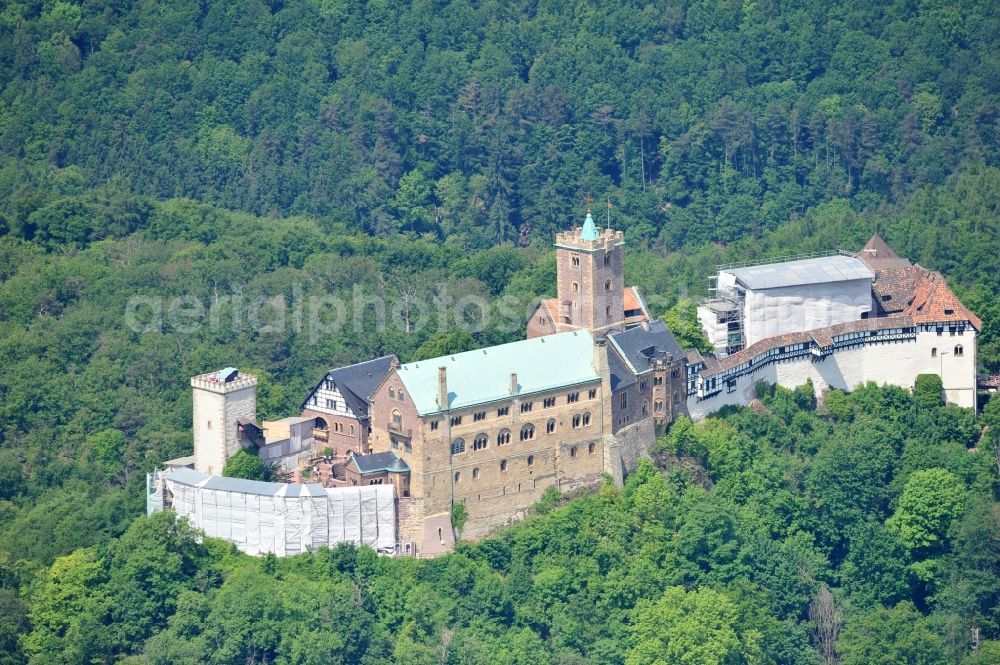 Aerial image Eisenach - View of the Wartburg-Stiftung Eisenach near Eisenach in Thuringia. The castle dates from the 11th Century, but has its present form since the mid-19th Century. Since 1999 it is a UNESCO World Heritage Site