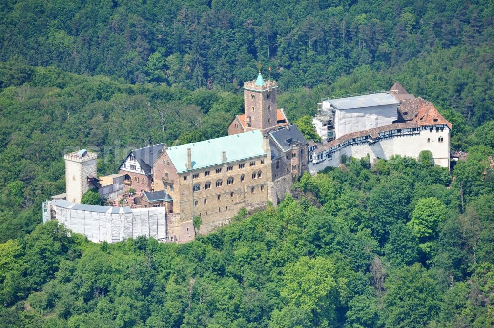 Aerial photograph Eisenach - View of the Wartburg-Stiftung Eisenach near Eisenach in Thuringia. The castle dates from the 11th Century, but has its present form since the mid-19th Century. Since 1999 it is a UNESCO World Heritage Site