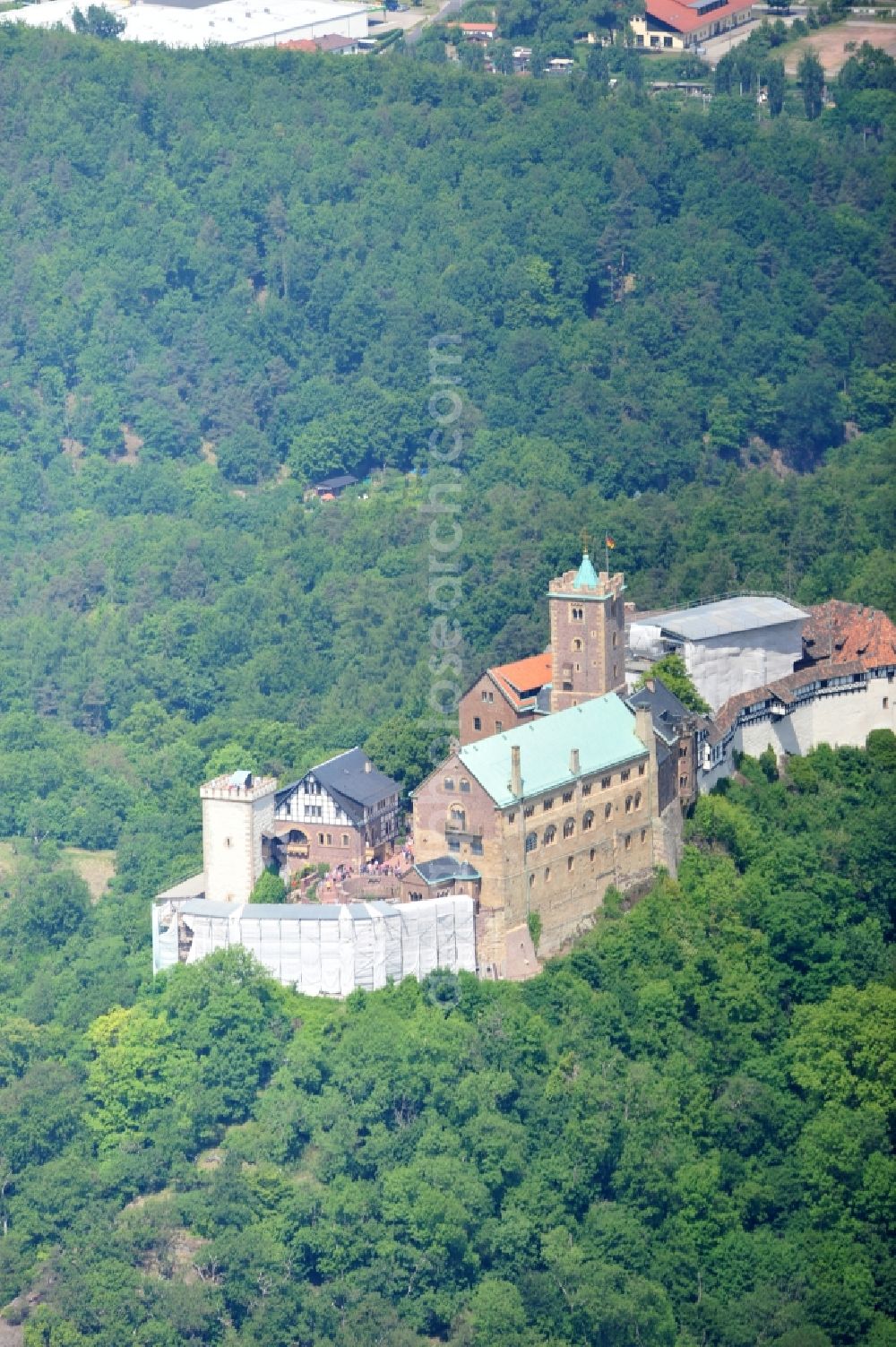 Eisenach from above - View of the Wartburg-Stiftung Eisenach near Eisenach in Thuringia. The castle dates from the 11th Century, but has its present form since the mid-19th Century. Since 1999 it is a UNESCO World Heritage Site