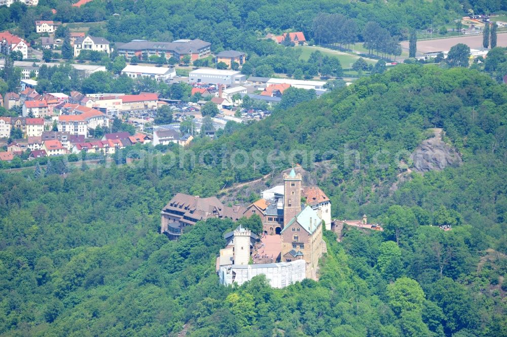 Aerial photograph Eisenach - View of the Wartburg-Stiftung Eisenach near Eisenach in Thuringia. The castle dates from the 11th Century, but has its present form since the mid-19th Century. Since 1999 it is a UNESCO World Heritage Site