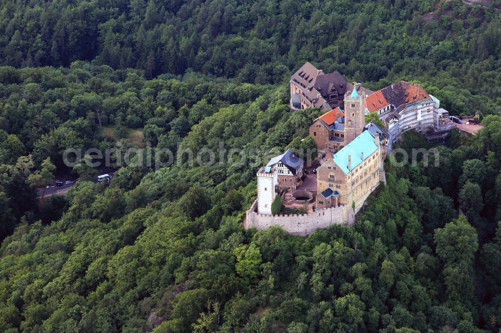 Aerial image Eisenach - View of the Wartburg-Stiftung Eisenach near Eisenach in Thuringia. The castle dates from the 11th Century, but has its present form since the mid-19th Century. Since 1999 it is a UNESCO World Heritage Site