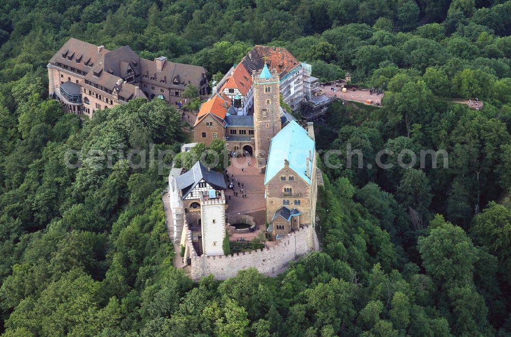 Aerial photograph Eisenach - View of the Wartburg-Stiftung Eisenach near Eisenach in Thuringia. The castle dates from the 11th Century, but has its present form since the mid-19th Century. Since 1999 it is a UNESCO World Heritage Site