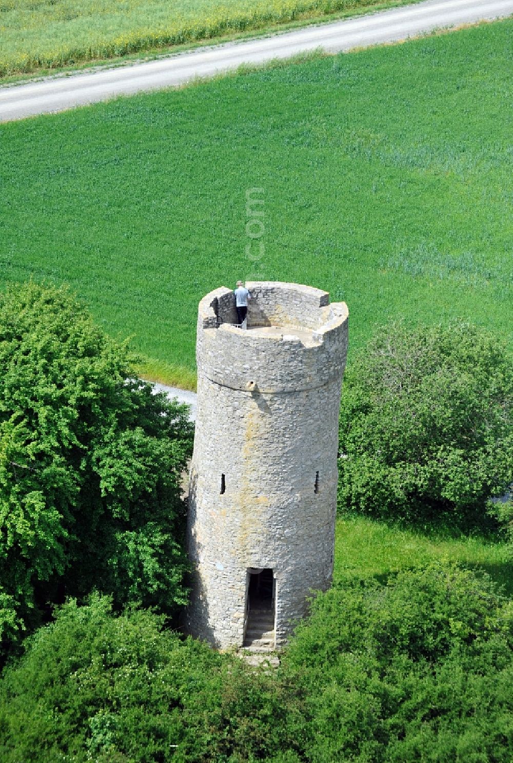 Münnerstadt from above - The Watchtower Schlegelwarte near Münnerstadt in Bavaria built in the 14th-15th Century is overlooking the Kreuzberg or Heidelstein