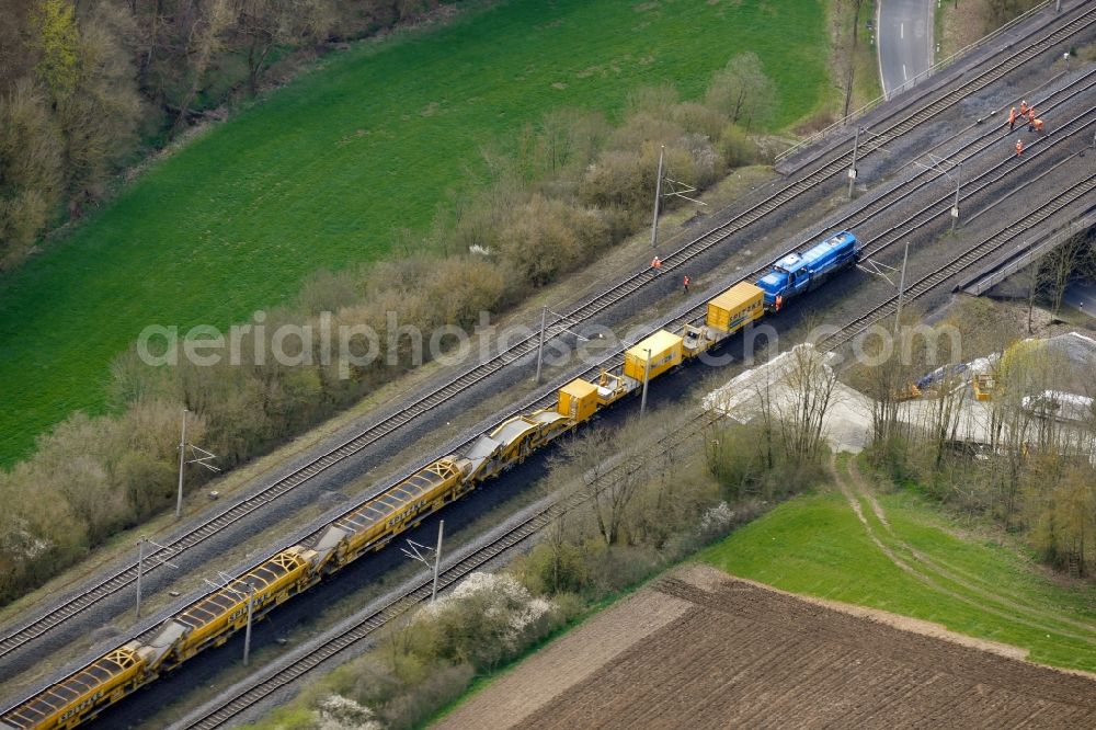 Aerial image Jühnde - Maintenance work on a rail track and overhead wiring harness in the route network of the Deutsche Bahn in Juehnde in the state Lower Saxony, Germany