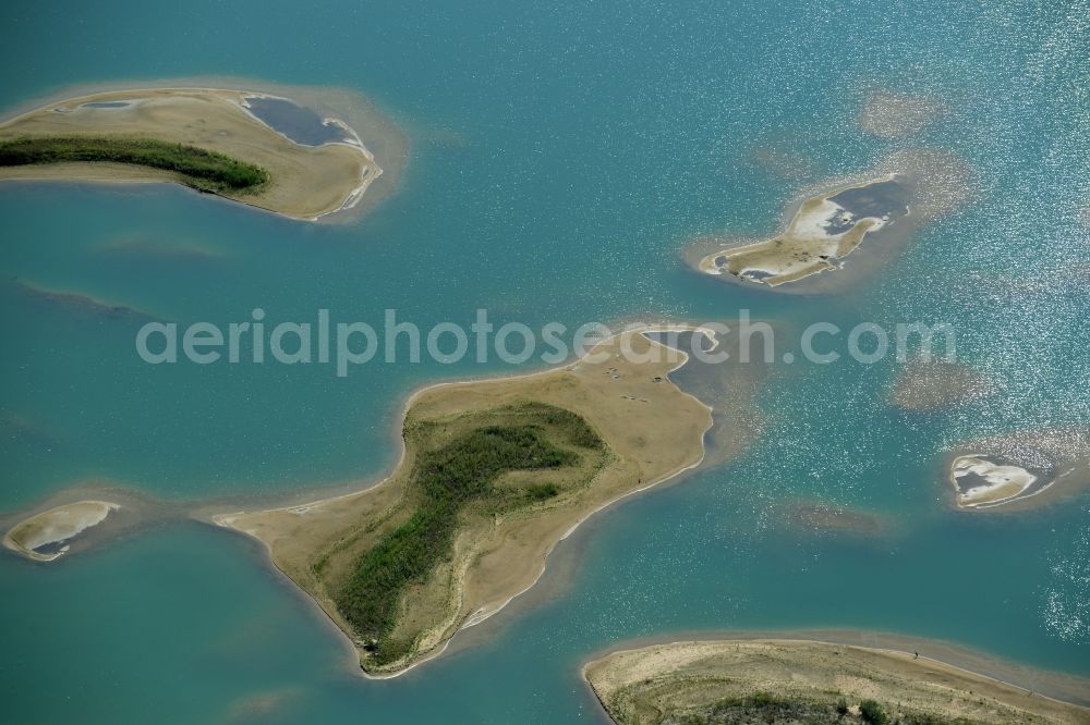 Laußig from above - Water landscape on gravel surface mining the gravel pit of Xella Deutschland GmbH in Laussig in Saxony