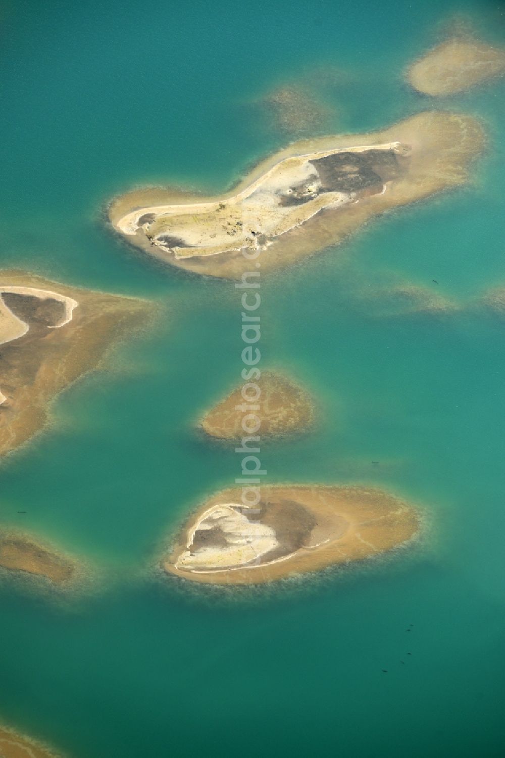 Aerial image Laußig - Water landscape on gravel surface mining the gravel pit of Xella Deutschland GmbH in Laussig in Saxony