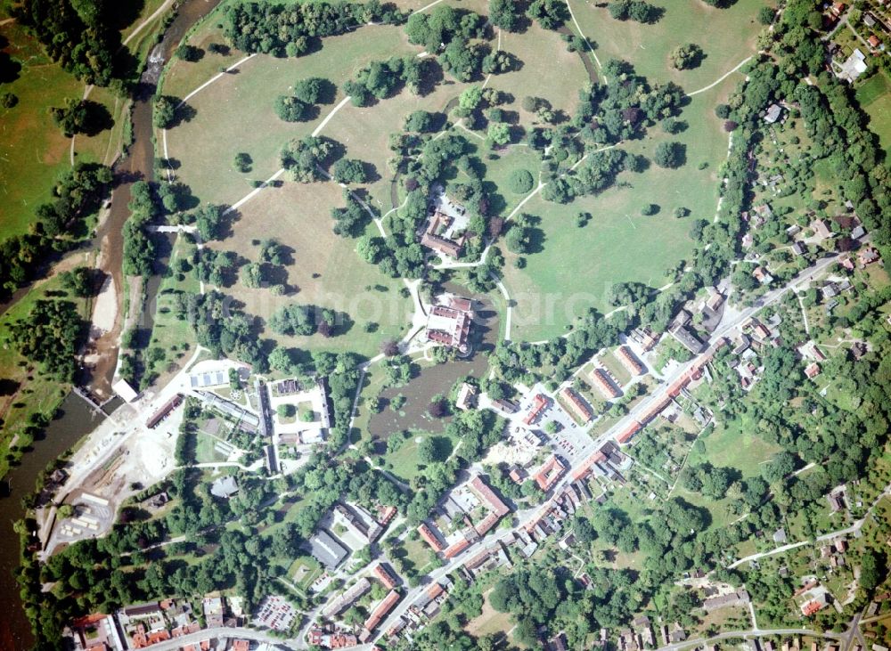 Bad Muskau from the bird's eye view: Building and castle park systems of water castle on Schlossstrasse in Fuerst-Pueckler-Park in Bad Muskau in the state Saxony, Germany