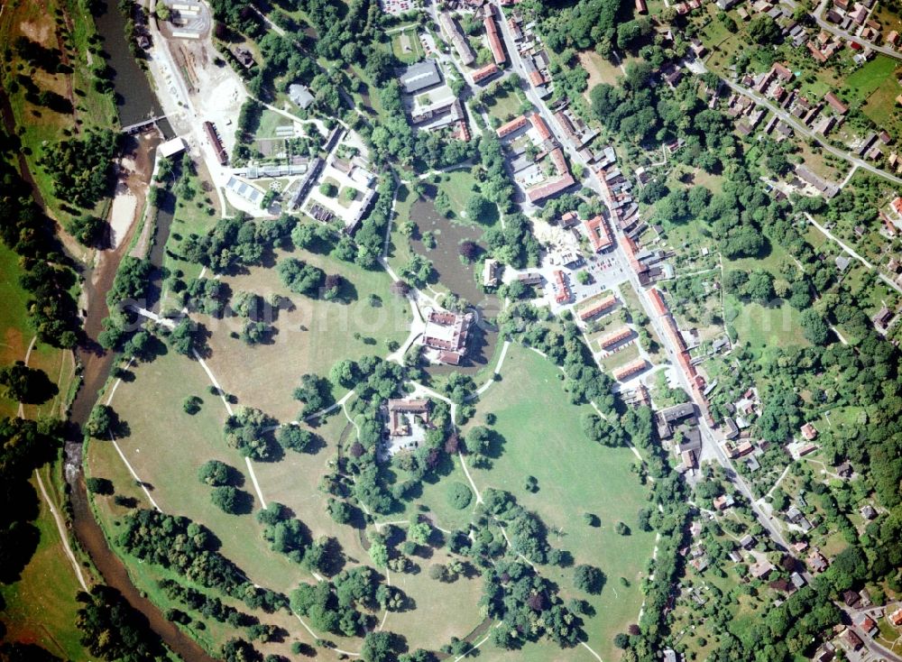 Aerial image Bad Muskau - Building and castle park systems of water castle on Schlossstrasse in Fuerst-Pueckler-Park in Bad Muskau in the state Saxony, Germany