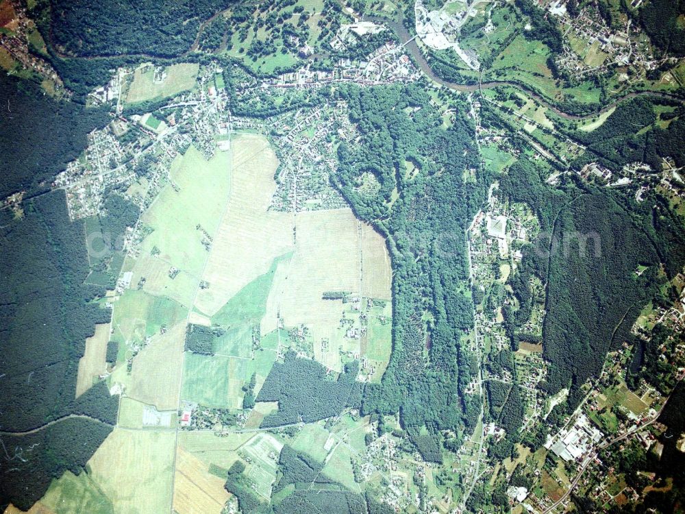 Bad Muskau from above - Building and castle park systems of water castle on Schlossstrasse in Fuerst-Pueckler-Park in Bad Muskau in the state Saxony, Germany