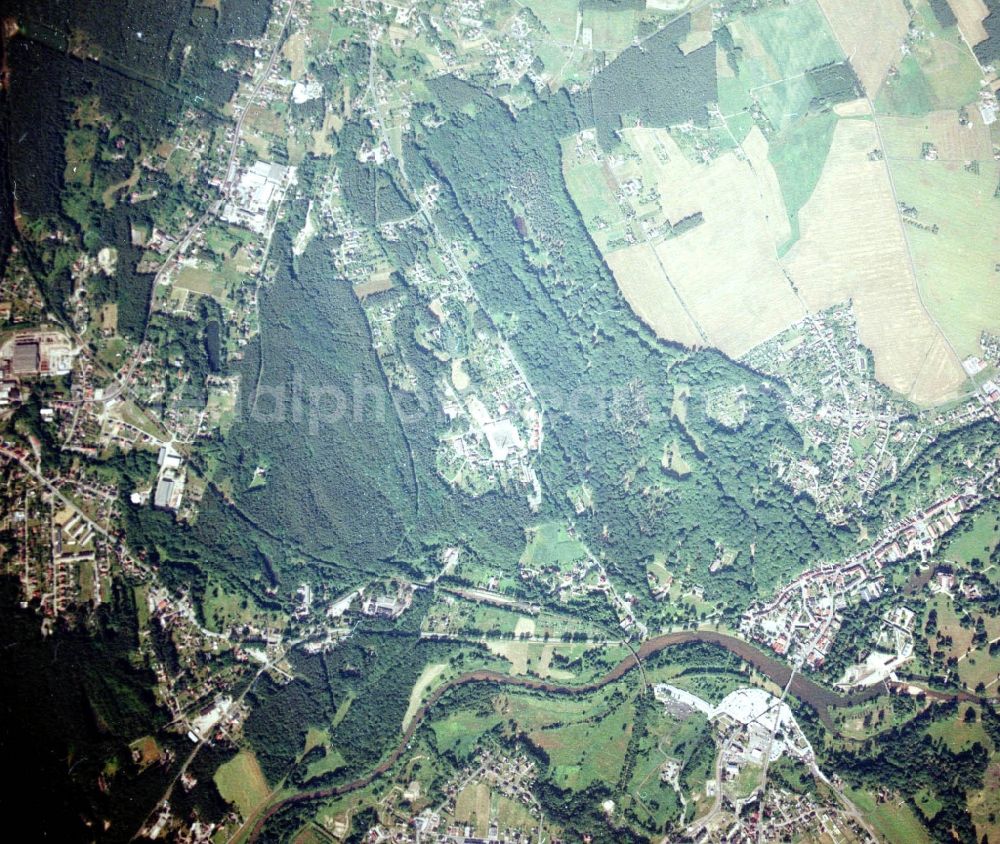 Bad Muskau from the bird's eye view: Building and castle park systems of water castle on Schlossstrasse in Fuerst-Pueckler-Park in Bad Muskau in the state Saxony, Germany