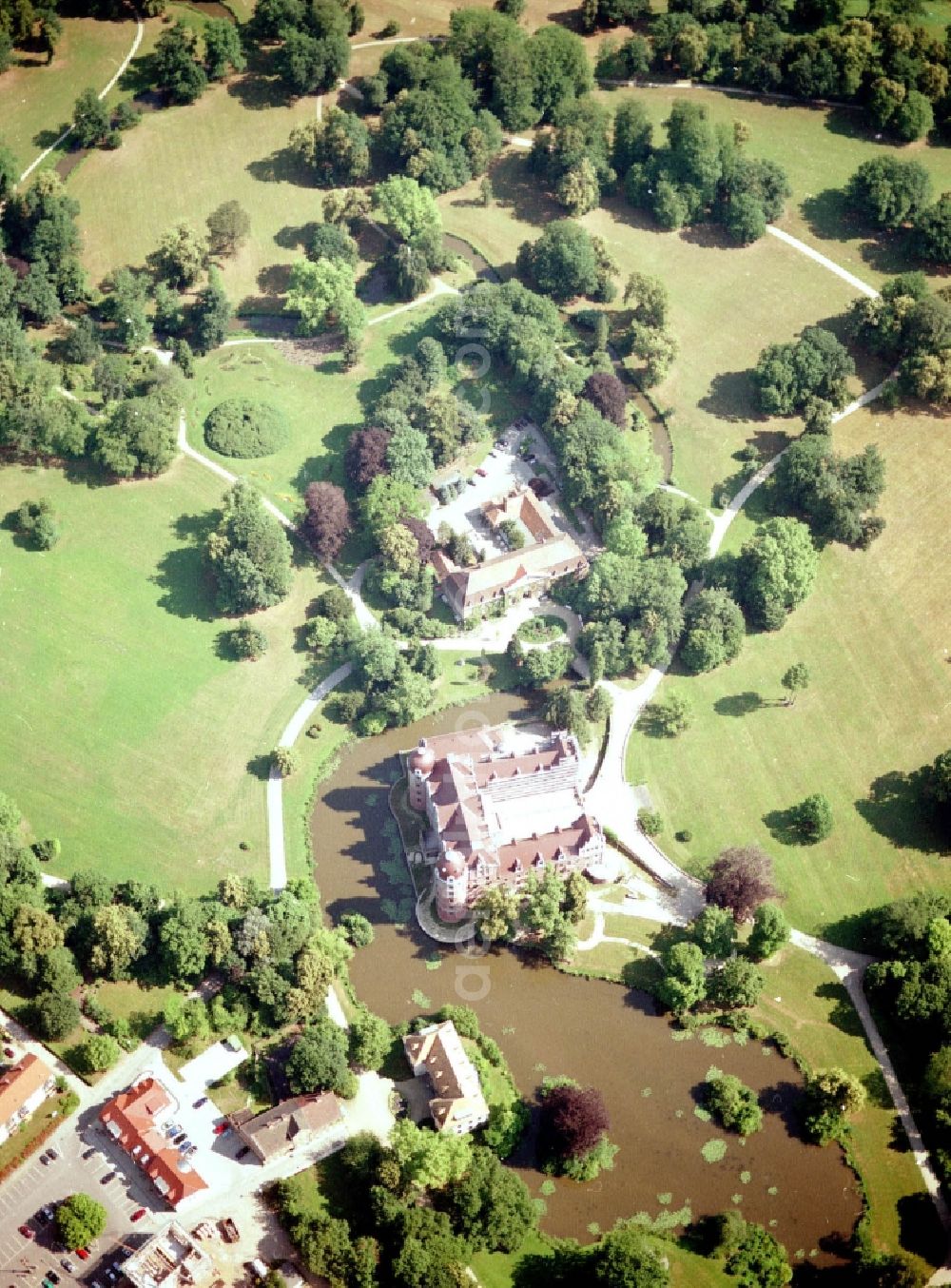 Aerial image Bad Muskau - Building and castle park systems of water castle on Schlossstrasse in Fuerst-Pueckler-Park in Bad Muskau in the state Saxony, Germany