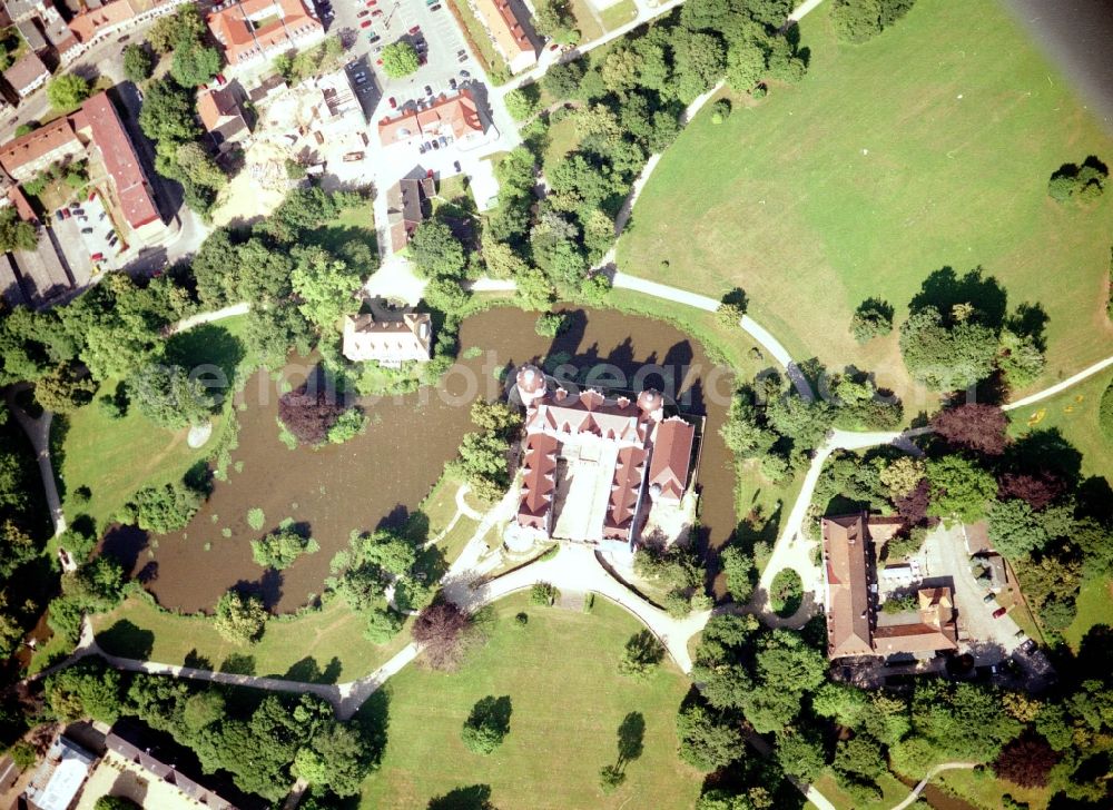 Bad Muskau from the bird's eye view: Building and castle park systems of water castle on Schlossstrasse in Fuerst-Pueckler-Park in Bad Muskau in the state Saxony, Germany