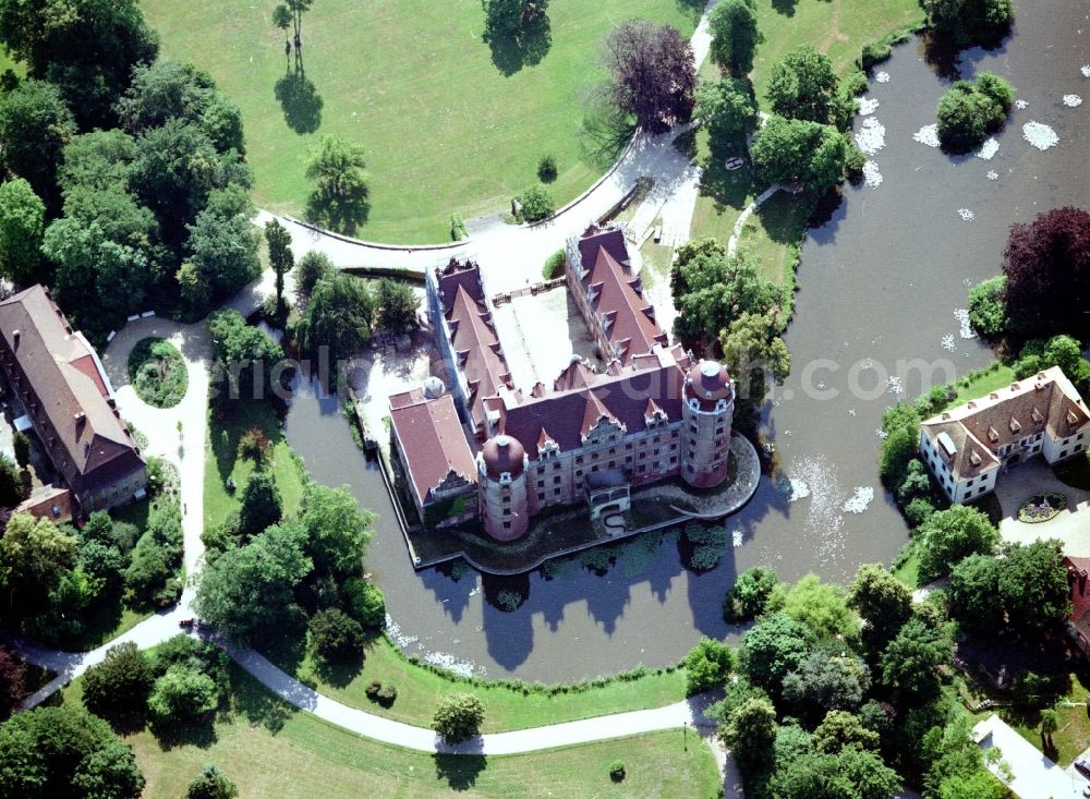 Bad Muskau from the bird's eye view: Building and castle park systems of water castle on Schlossstrasse in Fuerst-Pueckler-Park in Bad Muskau in the state Saxony, Germany