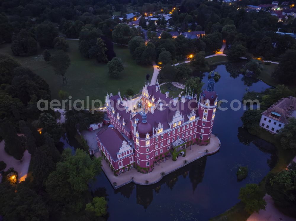 Aerial photograph Bad Muskau - Building and castle park systems of water castle on Schlossstrasse in Fuerst-Pueckler-Park in Bad Muskau in the state Saxony, Germany