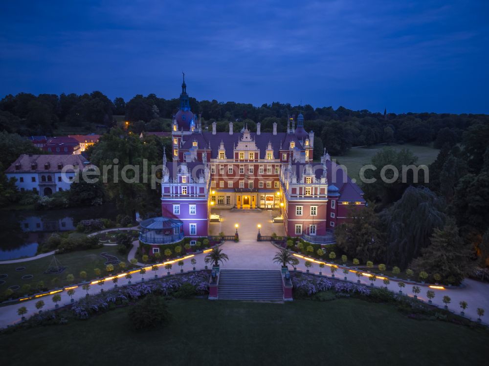 Bad Muskau from the bird's eye view: Building and castle park systems of water castle on Schlossstrasse in Fuerst-Pueckler-Park in Bad Muskau in the state Saxony, Germany