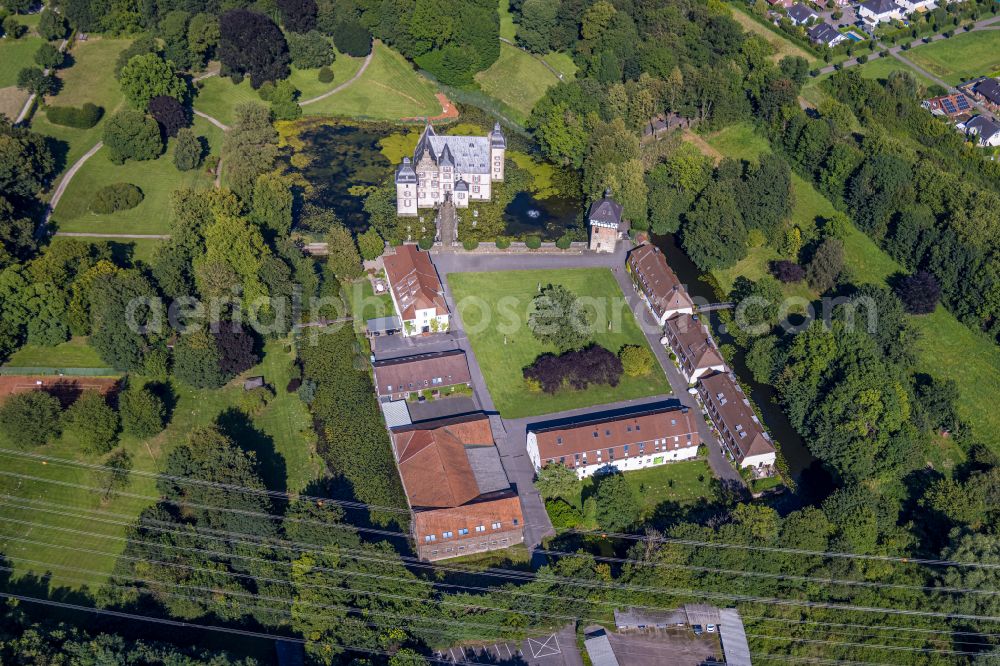 Bodelschwingh from above - Building and castle park systems of water castle Schloss Bodelschwingh in Bodelschwingh at Ruhrgebiet in the state North Rhine-Westphalia, Germany