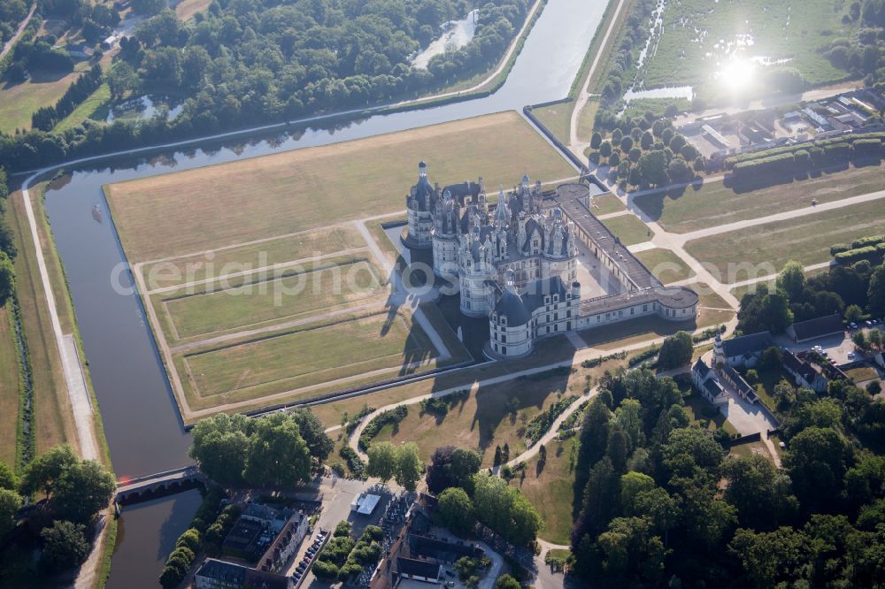 Aerial photograph Chambord - Building and castle park systems of water castle Chateau de Chambord on street Le Chateau in Chambord in Centre-Val de Loire, France