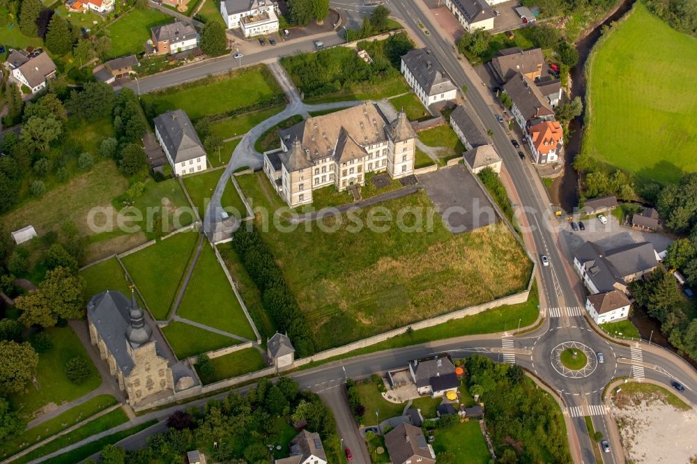 Warstein from above - Building and castle park systems of water castle Deutschordensschloss in Muelheim in Warstein in the state North Rhine-Westphalia