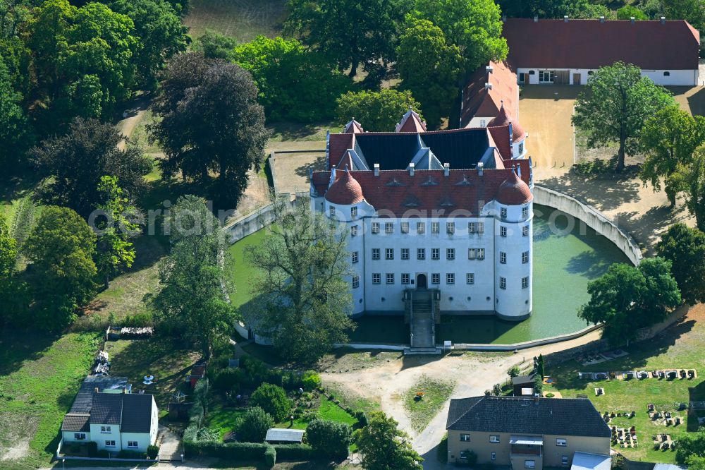 Aerial image Großkmehlen - Building and castle park systems of water castle in Grosskmehlen in the state Brandenburg, Germany