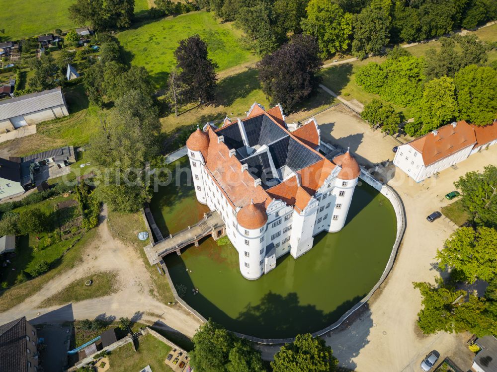 Aerial image Großkmehlen - Building and castle park systems of water castle in Grosskmehlen in the state Brandenburg, Germany